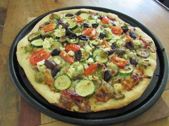 Lunch.....homemade pizza with zucchini, garlic scape pesto, fresh tomato, and olives